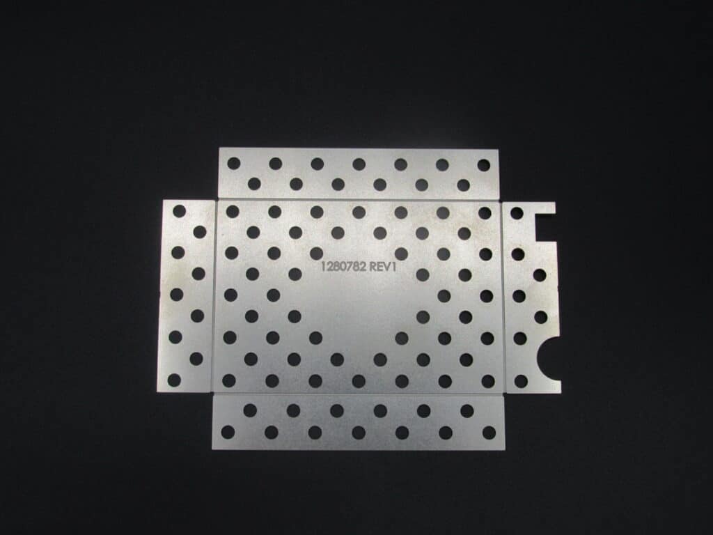 photo etched emi shield with part number 